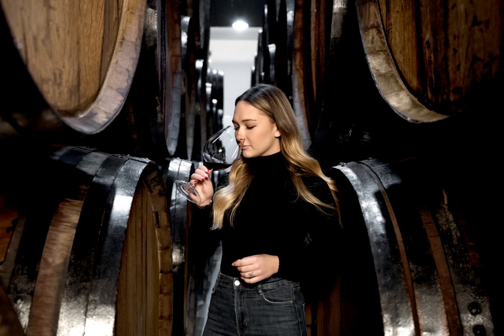 woman tasting wine